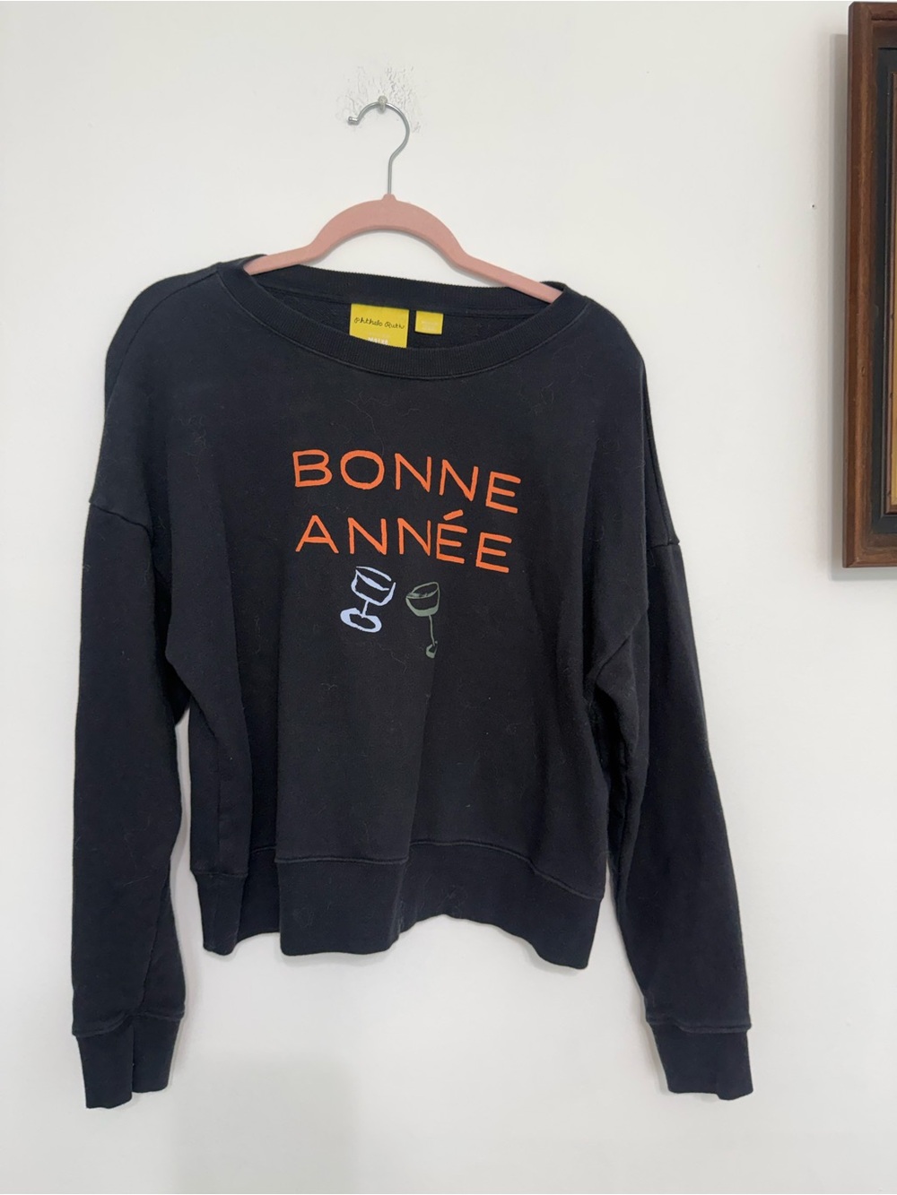 Maeve Black Crewneck Sweatshirt with Orange 'Bonne Année' Graphic